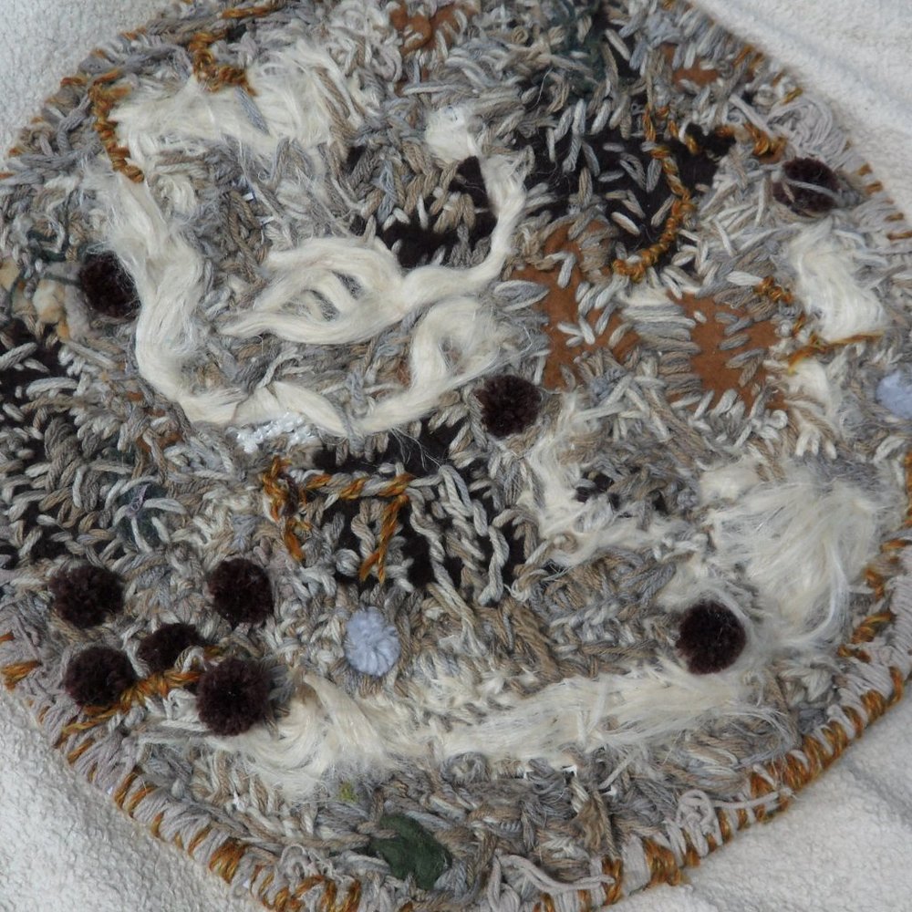 Handmade fiber art round